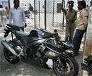 The damaged motorcycle of  former cricketer Md Azharuddin's son Ayazuddin outside a police station in Hyderabad. PTI