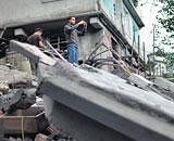 The debris of a building which  collapsed in Sundays earthquake in Gangtok. AP