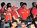 Curious Members of RCB watching the concert. DH Photo by M S Manjunath