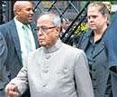 Finance Minister Pranab Mukherjee comes out after meeting Prime Minister Manmohan Singh in New York on Sunday. PTI