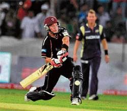 power-packed Somersets Roelof Van der Merwe hammers one to the fence during their Champions League Twenty20 match against Kolkata Knight Riders in Hyderabad on Sunday. AFP