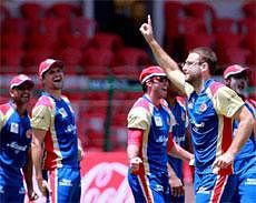 Royal Challengers Bangalore skipper Daniel Vettori with team mates during a training session for the Champions League in Bangalore. PTI File Photo
