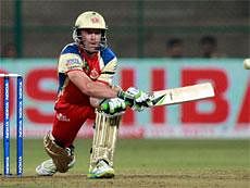 Royal Challengers Bangalore AB De Villiers plays a shot during the match against Warriors in Champions league T20-2011 at Chinnaswamy in Bangalore on Friday. PTI