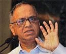 Infosys founder N R Narayan Murthy speaks at the Pan IIT annual conference in New York on Saturday. PTI