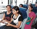 ENJOYING THE RIDE: Women  commuters in the pink bus