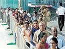 Curious: Passengers wait in queue for tickets at MG Road Metro station on Saturday. DH Photo