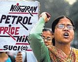 peoples ire: An activist of Socialist Unity Centre of India (Communist) shouts slogans during a rally organised in protest against the petrol price increase in Kolkata on Friday. AFP