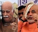 Senior BJP leader L K Advani and Gujarat Chief Minister Narendra Modi at a public meeting during his Jan Chetna Yatra at Valsad in Gujarat on Sunday. PTI Photo