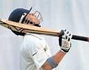 Take a bow! Sachin Tendulkar looks skyward after scoring 15,000 runs in Tests. AFP
