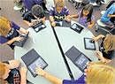 Lindbergh Elementary students try their new iPads during the ''Project REAL'' kickoff celebration at Little Falls Community High School in Little Falls, Minnesota, USA. NYT