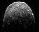 This image made from radar data obtained on Nov. 7, 2011 at 11:45 a.m. PST (2:45 p.m. EST/1945 UTC) and provided by NASA shows asteroid 2005 YU55 when the space rock was at 3.6 lunar distances, which is about 860,000 miles, or 1.38 million kilometers, from Earth. The asteroid the size of an aircraft carrier is set to make a close but harmless swing by Earth on Tuesday, Nov. 8, 2011. Scientists at NASA's Near-Earth Object Program, which tracks asteroids and comets, ruled out any chance of impact. AP