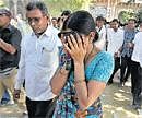 An unidentified relative of one of the convicted Hindus breaks down upon hearing the verdict at the district court in Mehsana, about 40 kilometres north of Ahmedabad on Wednesday.
