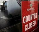 The window of a closed Kingfisher Airlines booking counter at the city airport in Mumbai on November 11, 2011. Shares in India's Kingfisher Airlines fell more than 19 percent on Friday after a string of flight cancellations heaped further problems on the debt-ridden carrier.The loss-making airline, the country's second-biggest, said on Tuesday that it was cancelling at least 50 flights a day every day until November 19. AFP