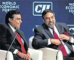 Reliance Industries Chairman Mukesh Ambani (left) and Commerce and Industry Minister Anand Sharma at the India Economic Summit in Mumbai on Sunday. PTI