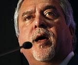 Chairman and CEO of India's Kingfisher Airlines Vijay Mallya speaks during a press conference in Mumbai on Tuesday. AP