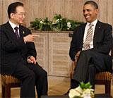 U.S. President Barack Obama (R) meets with China's Premier Wen Jiabao on the sidelines of the East Asia Summit in Nusa Dua, Bali, November 19, 2011. Reuters
