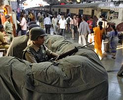 A guard at the Chatrapati shivaji railway station. REUTERS file Photo