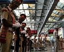 Policemen pay tributes to the victims of 26/11 Mumbai terror attack, to mark its 3rd anniversary, at CST railway station in Mumbai on Saturday. PTI Photo