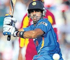 Indias Manoj Tiwary guides one down the leg side during his knock of 104 in the fifth and final ODI against the West Indies. AFP