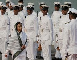 President Pratibha Patil inspects a Guard of Honour after arriving at the naval base for Fleet Review (PFR-11) in Mumbai on Tuesday. AFP