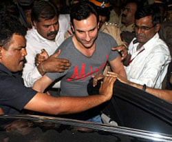 Bollywood actor Saif Ali Khan emerging out of Colaba Police Station after getting bail in assault case filed against him by an NRI businessman in Mumbai on Wednesday. PTI