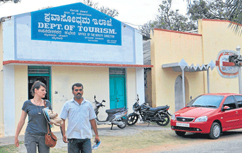 Tourists come out of the office of deputy director at Dasara Exhibition Grounds in Mysore recently. DH Photo