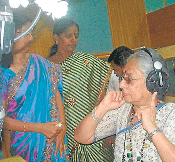 Rajya Sabha member and cine artiste Jayashri renders a song at the launch of Jana Dhwani a community radio in Sargur on Friday.  DH Photo