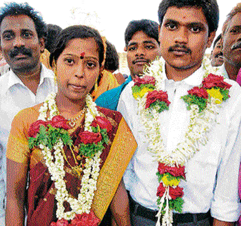 Geetha and Shivaraj after their marriage at a temple in Mysore on Friday.DH photos