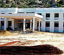 The administrative section of the Bangalore University Post-graduation Centre under construction in Kolar. DH file photo