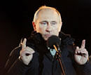 Tearful Putin wins back Russian presidency