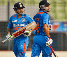 India's Virat Kohli, right, and Gautam Gambhir run between the wickets during their Asia Cup cricket match against Sri Lanka in Dhaka, Bangladesh on Tuesday. (AP Photo)