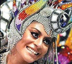 Parade : A samba dancer at the Rio Carnival (photo by author); (left) a float at the carnival.
