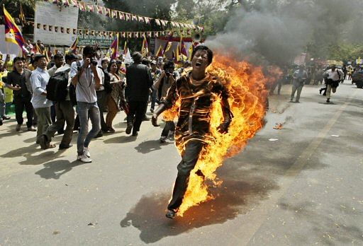 Tibetan activist sets himself ablaze, battles for life