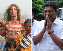 This combination of pictures show Italian national Paolo Bosusco (L) posing with tribals and  Orissa MLA Jhina Hikaka.  File Photo/AFP
