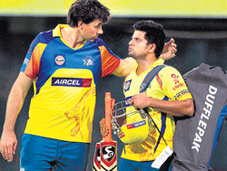 youre doing fine CSK coach Stephen Fleming shares a point with Suresh Raina on Wednesday. AP