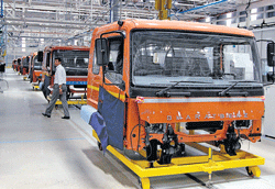 Global manufacturers go local in cost-wary India