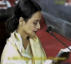 Bollywood actress Rekha taking oath as a Rajya Sabha member in New Delhi on Tuesday. PTI