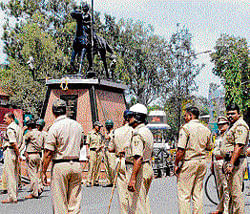 Policemen during a protest by Karnataka Rakshana Vedike  at Channamma Circle in Belgaum on Sunday. KPN
