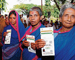 identity: Inmates of the Beggars Colony display their Aadhaar cards. dh photo
