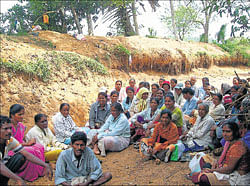 Labourers who are engaged in the work on desilting a canal.