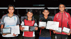 Champions Winners of the State-ranking badminton meet. From left: Shikha Gautam (girls U-15 singles and doubles), Mithula UK&#8200;(girls U-13 singles and doubles), Amogh R Gupta  (boys U-13 singles) and Mithun Manjunath (boys U-15 singles and doubles). DH PHOTO