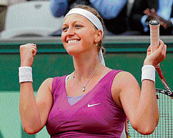 czech fighter: Petra Kvitova exults after defeating Yaroslava Shvedova in the French Open quarterfinals. AP