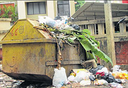 A view of the overflowing garbage container at Pandeshwar in Mangalore.