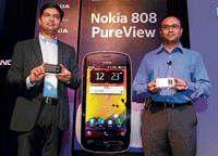 Nokia India Director & Head of Smart Devices Vipul Mehrotra (left) and Head of Product  Marketing Kaustuv Chatterjee at the launch of PureView in New Delhi on Wednesday. PTI