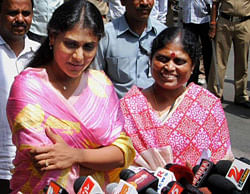 YSR Congress chief Jaganmohan Reddy's mother Vijayalakshmi (R) and sister YS Sharmila interact with the media after meeting him at Chanchalguda Jail in Hyderabad on Friday, following the party's success in the by-elections. PTI