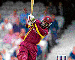 back in business West Indies Chris Gayle smashes one to the fence during his sparkling half-century on Tuesday. AP