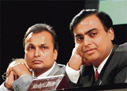 Companies owned by Ambani brothers, Mukesh (right) and Anil, were criticised by research analysts.