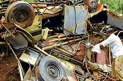 The mangled remains of the Tempo which was crushed under a lorry on Kalghatgi-Yellapur road on Tuesday. DH Photo