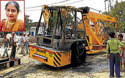 The crane was torched by victim Tarunas (inset) relatives and locals. PTI&#8200;PHOTO