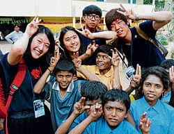Bonding: Participants in the India-South Korea youth exchange programme organised at Gutte Government School in Bangalore on Tuesday. dh photo